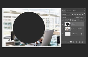 How to crop a single layer in Photoshop: create a circle shape.